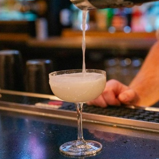 Cocktail being poured